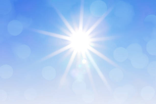 istock Bright sun with beautiful beams and bokeh light in the sky 2169493027
