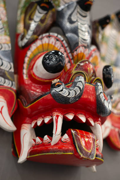 istock A religious mask painted from wood. With fangs. 2169495567