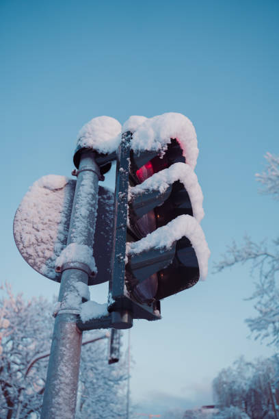 istock Red Trafficlight Covered with Snow Close Up 2169497190