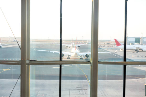 istock Airplane on Runway at Modern Airport 2169497243