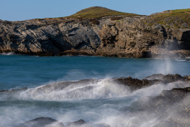 istock Waves crashing on rocks in newquay, cornwall, england 2169498847