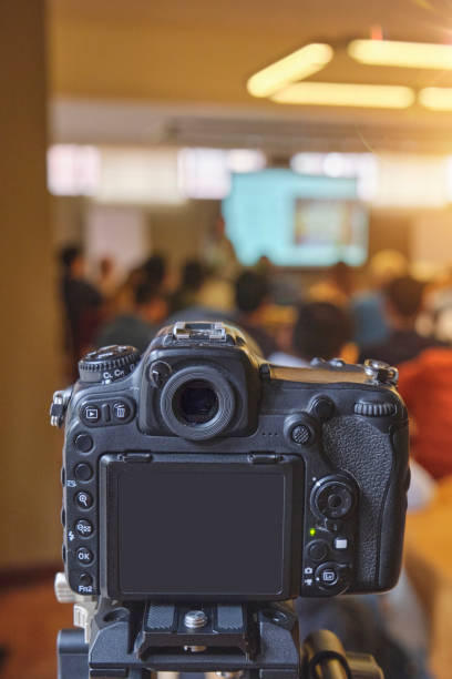istock A camera is pointed at a group of people 2169499705