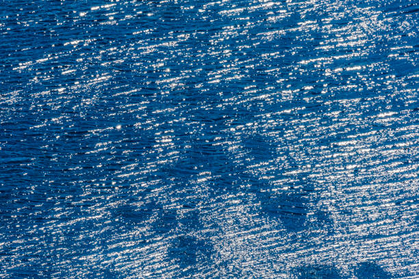 istock Water Reflection Abstract Swimming Area Lion's Den Plymouth Devon England 2169509323