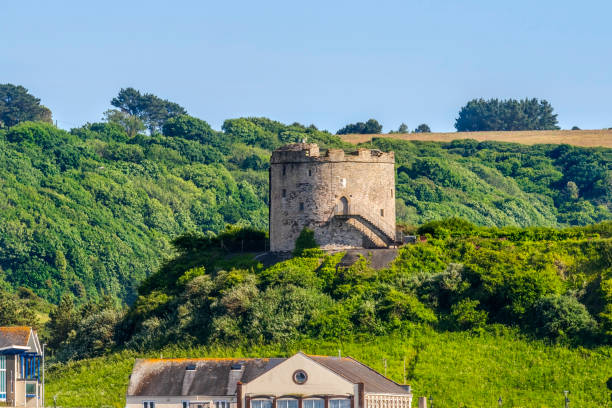 Stone walls and archways create a captivating scene inside dartmouth castle, a historic landmark in devon, england