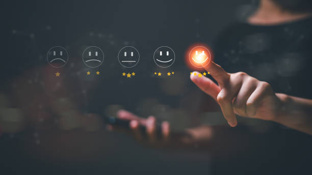 istock The businessman pressed a smiley face emoticon on the virtual touch screen, a customer service evaluation concept. 2169511076