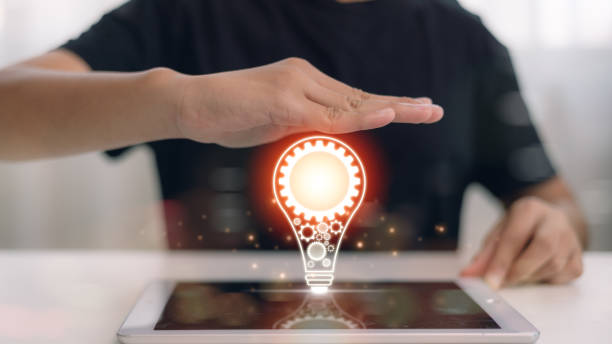 istock Innovation. Hands hold light bulb for Concept new idea concept with innovation and inspiration, innovative technology in science and communication concept. 2169511102