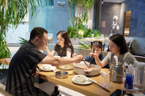 Asian family having meal