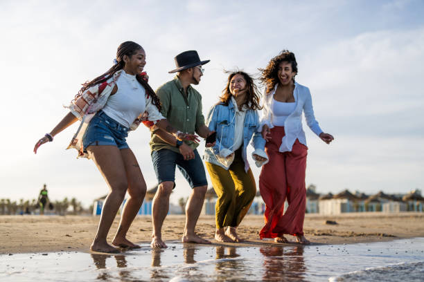 istock Joyful Beach Party with Diverse Friends Dancing 2169523806
