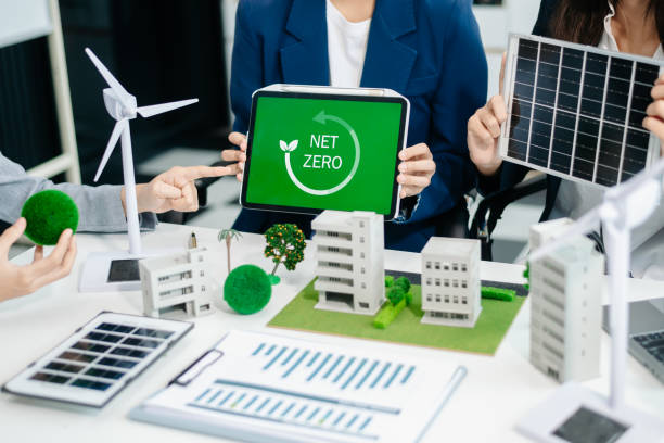 istock Business team people planning hand using laptop for working technology and business Net zero and carbon neutral concept.NET ZERO icons 2169529244