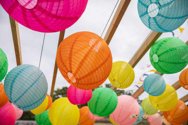 istock Beautiful colourful lanterns suspended from a ceiling - brightening the space and bringing colour light and joy to the environment. 2169535102