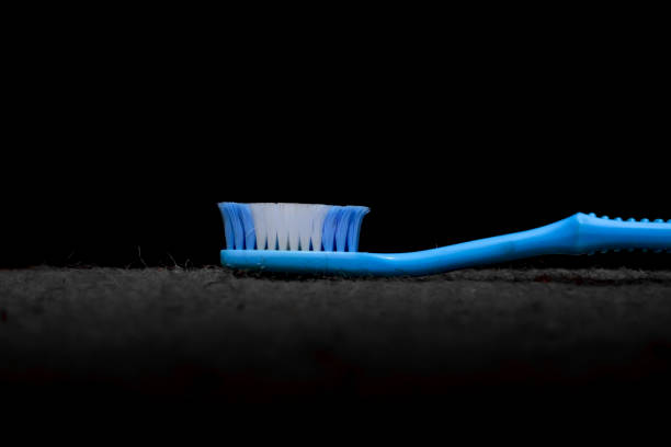 A toothbrush isolated on a dark background