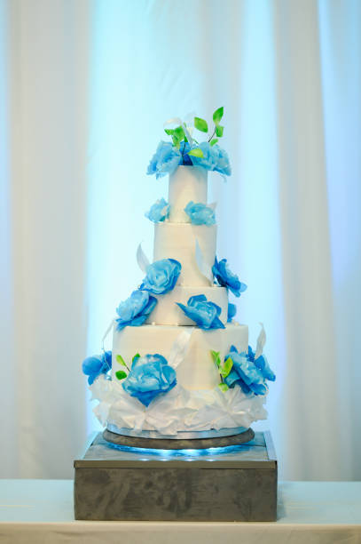 istock Beautiful blue wedding cake decorated with flowers 2169541655