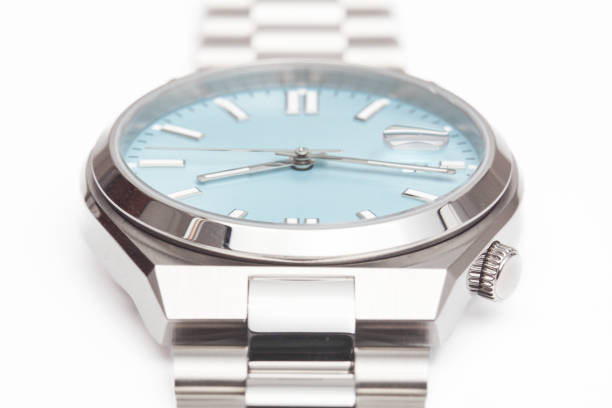 istock Modern luxury silver watch close up isolated on white 2169542099