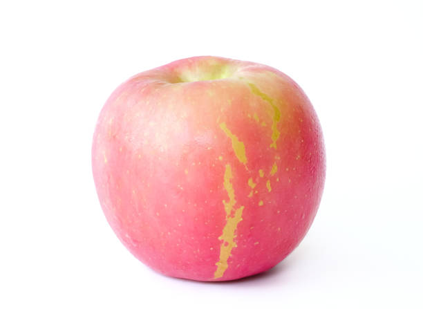Fresh ripe delicious red apples on white