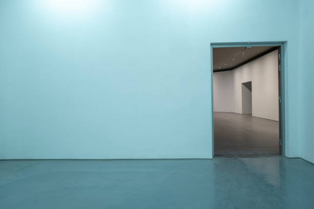 Open doors on the walls of empty modern concrete buildings