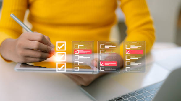 istock Document Management Checking System, Online survey filling out and digital form checklist, online documentation database, and process manage files. 2169547490