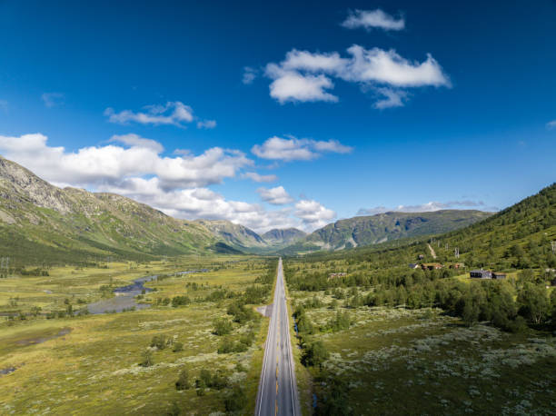 istock Endless road through Norwegian mountain valley 2169560658