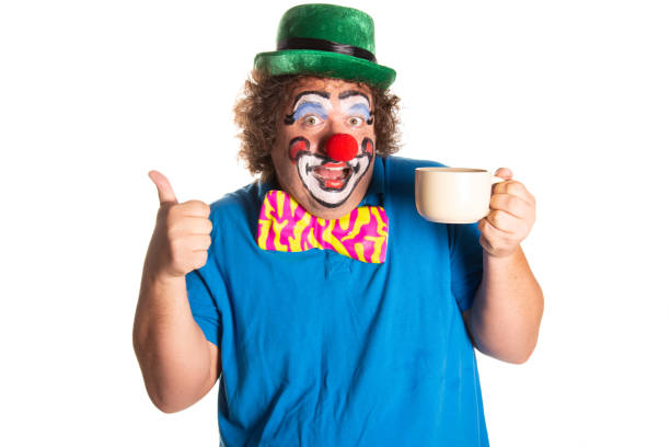 Funny fat clown posing on a white background.