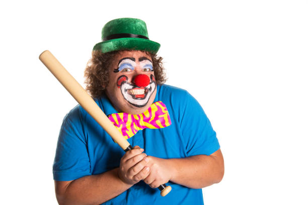 istock Evil clown from horror movies posing on a white background. 2169561298