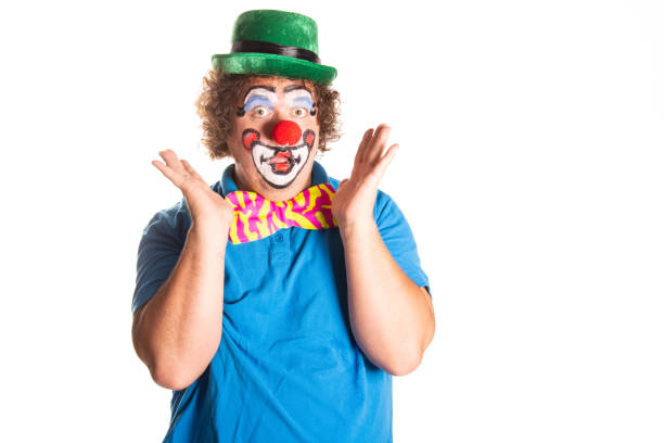 istock Funny fat clown posing on a white background. 2169561358