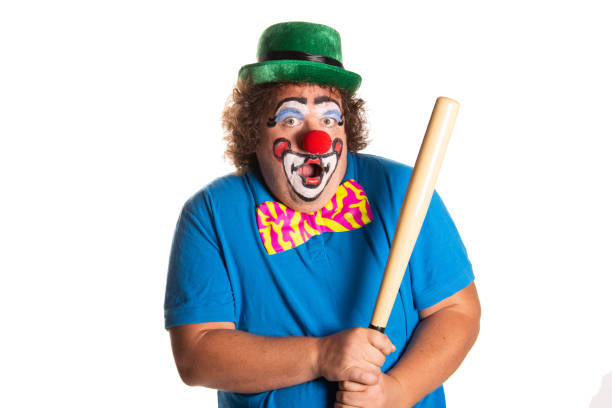 istock Evil clown from horror movies posing on a white background. 2169561367