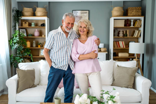 istock Smiling senior couple at home 2169564722