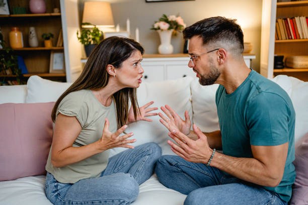 istock Young couple argues at home 2169567095