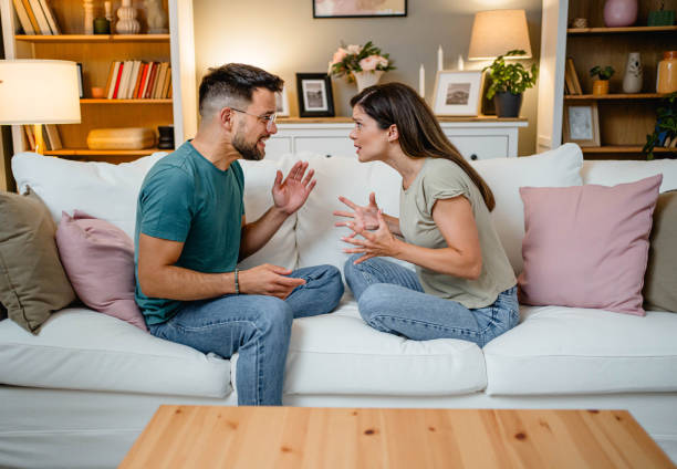 istock Young couple argues at home 2169567107