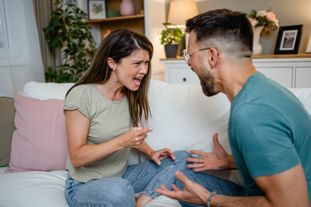 istock Young couple argues at home 2169567109
