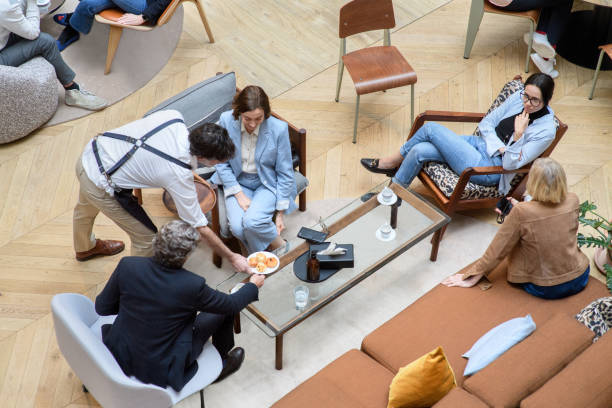 istock A group of 4 people have breakfast in a cafe 2169571882