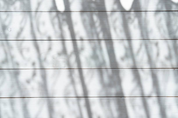Surface of white boards with rays of light