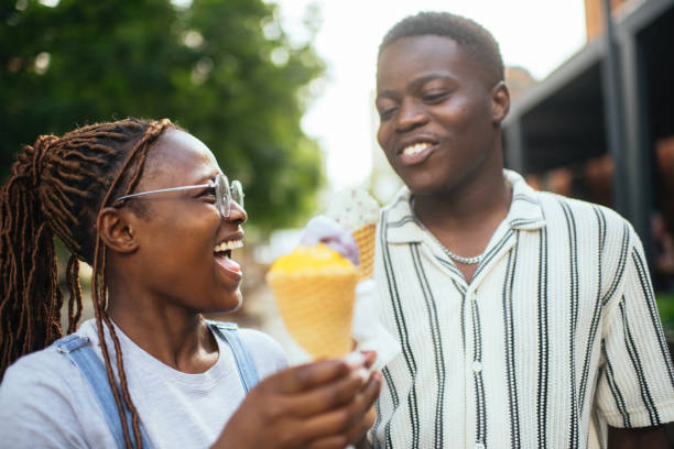 istock Young couple with ice-cream outdoors in summer 2169574624