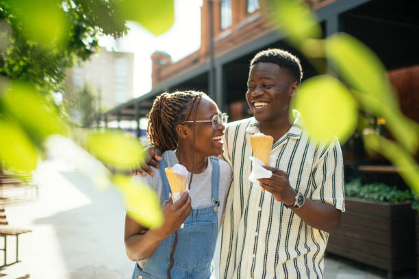 istock Young couple with ice-cream outdoors in summer 2169575462