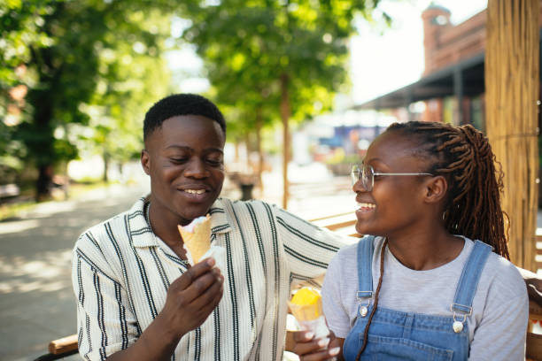 istock Young couple with ice-cream outdoors in summer 2169575750