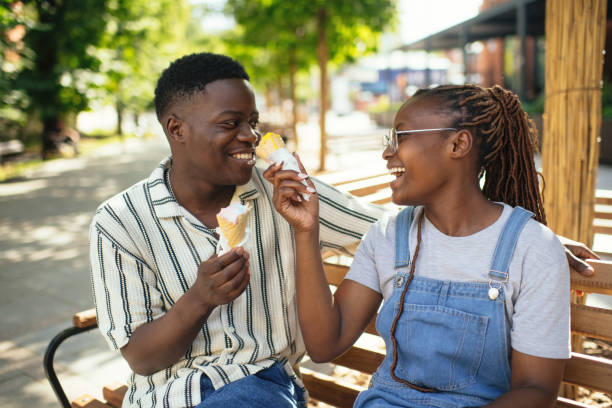 istock Young couple with ice-cream outdoors in summer 2169575945