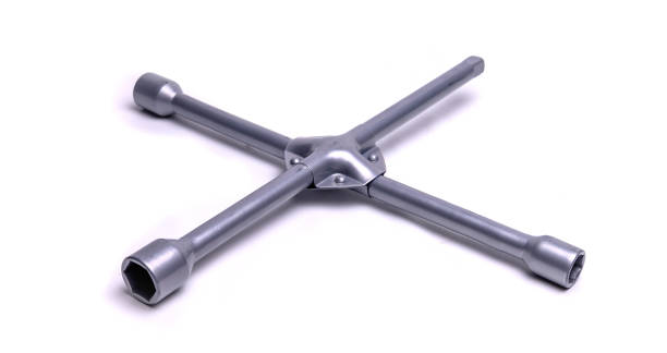 istock Car wheel wrench on white 2169579813