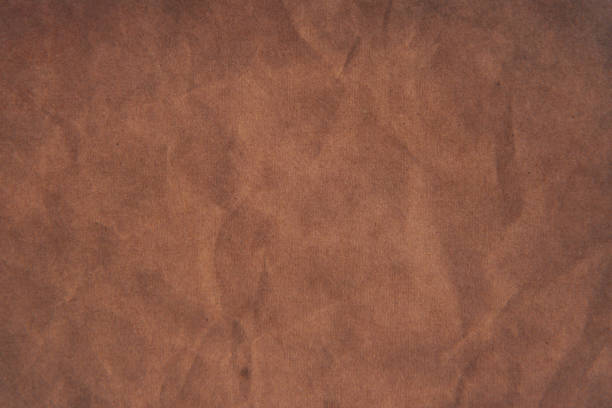 istock Dark orange,brown color leather skin natural with design lines pattern or red abstract background.can use wallpaper or backdrop 2169584540