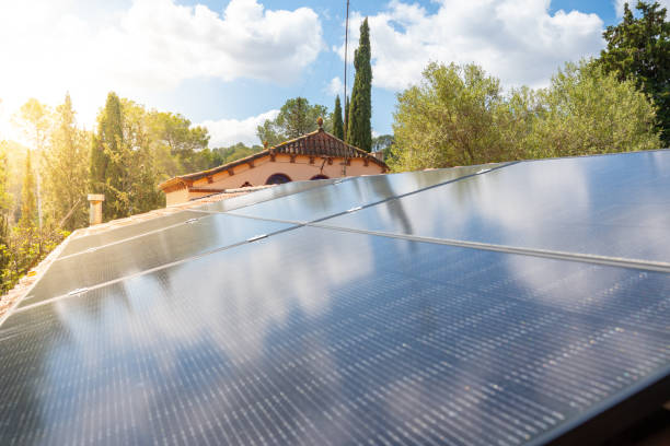 istock Solar panels line the rooftop, harnessing energy from the sun. 2169594759