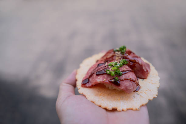 Wagyu beef sushi with Japanese sauce