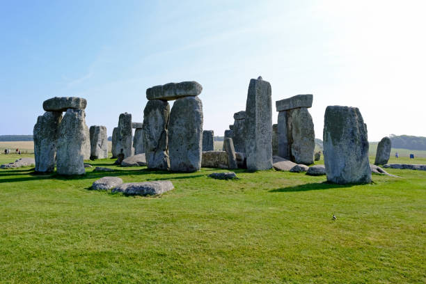 istock Stonehenge ancient neolithic stone circle with sunlit shadows. Wiltshire 2169609386