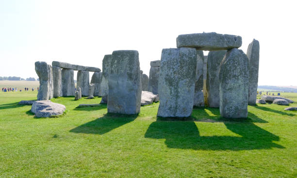 istock Stonehenge ancient neolithic stone circle with sunlit shadows. Wiltshire 2169609444