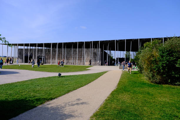 Stonehenge, Wiltshire, United Kingdom, August 30, 2024. English Heritage contemporary visitor centre and 'gateway' to the ancient neolithic stone circle. Sunny summer day outdoors