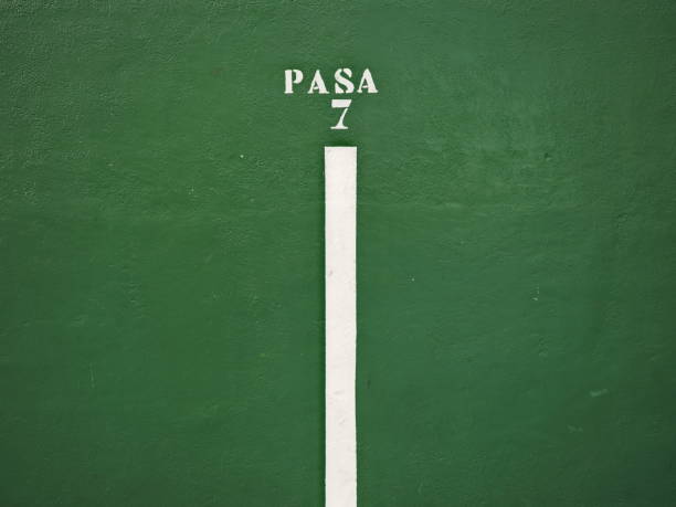 Pass sign at number 7 of a green fronton in the village of Trapagaran