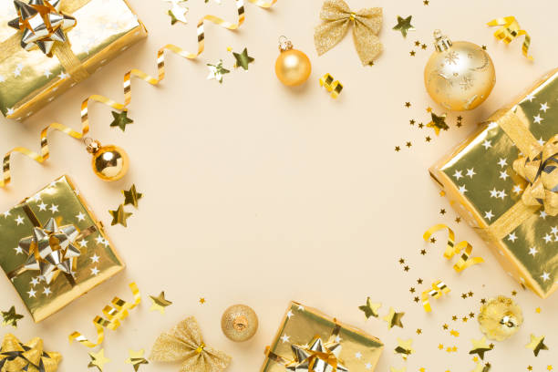 istock Christmas decor, gift boxes and confetti on color background, top view. Copy space for design 2169619618
