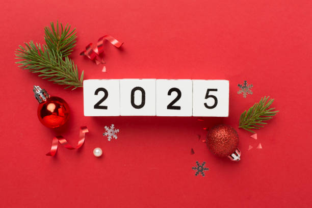 2025 with confetti and decor on color background, top view