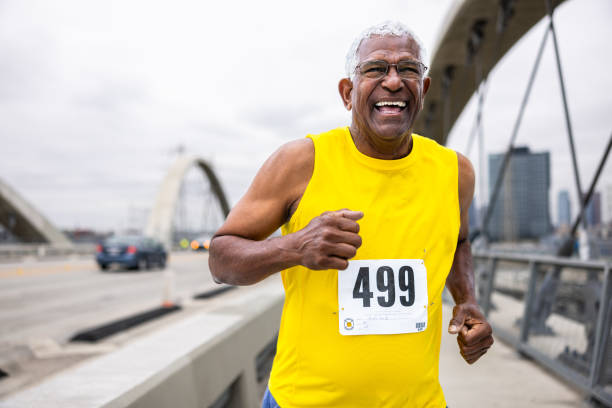 Senior black man running in a marathon