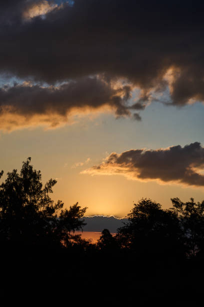 istock Beautiful sunset over the forest trees, aerial view 2169621233