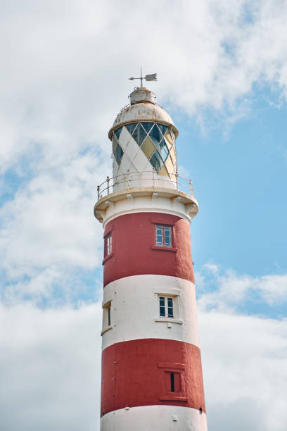 istock Lighthouse on a cliff during sunset in Albion, Mauritius 2169621383