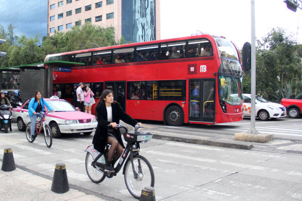 Mexico City, Mexico - Aug 23 2023: The Metrobus is a red double-decker rapid transit bus system with an exclusive lane in CDMX that suffers constant accidents