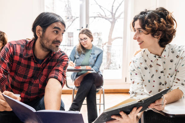 istock Student friends studying together in the classroom 2169625536